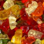 A pile of colorful gummy bears, ready for bottling.