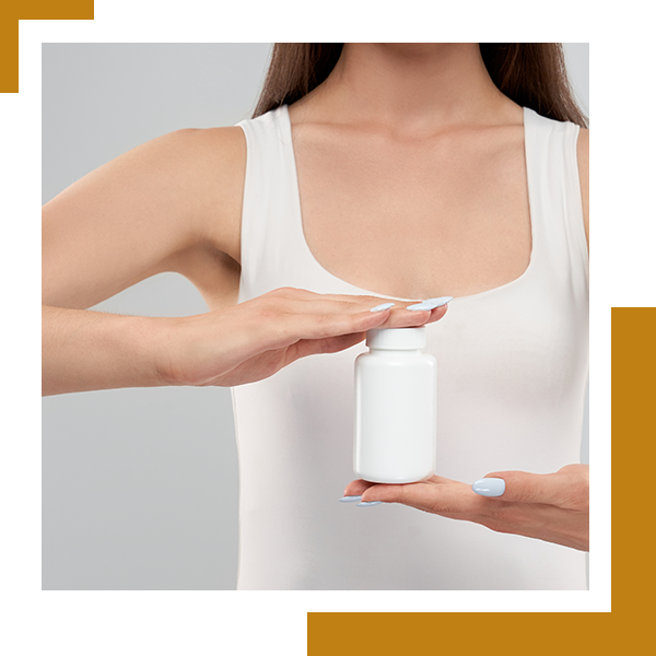 image of a woman holding a Nutraceutical bottle